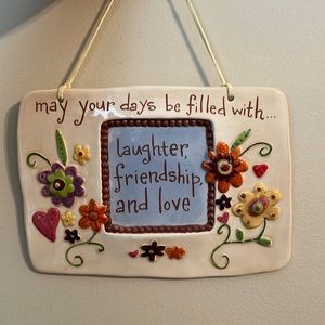 Natural Life “May your days be filled with…laughter, friendship, and love” sign
